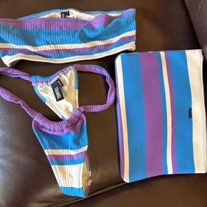 Triangl bikini.  Top size small Bottom size medium. Blue/purple/white